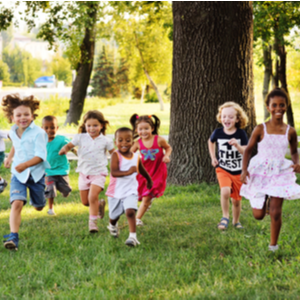 Summer Camp and Your Dependent Care FSA 

(Group of children ages 3-10 years old running in a green field)