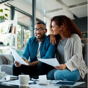 Couple talking about their benefits checklist